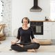 woman meditating at home stress relief