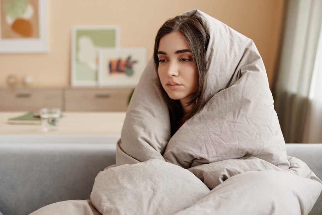  Woman feeling anxious after a nightmare