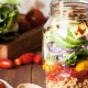 A glass jar filled with healthy foods